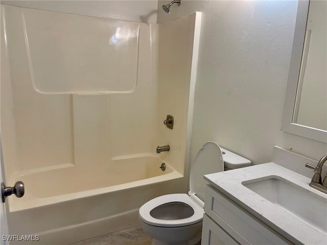 bathroom with vanity, shower / tub combination, toilet, and tile patterned floors