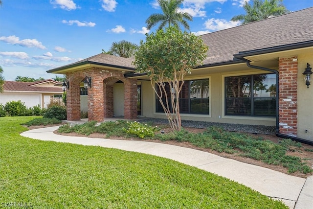 view of front of house with a front yard