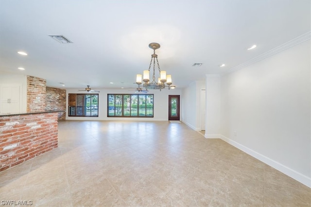 unfurnished living room featuring brick wall, ornamental molding, light tile floors, and ceiling fan with notable chandelier