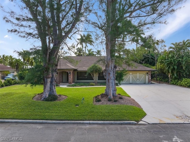 view of front of home with a front lawn