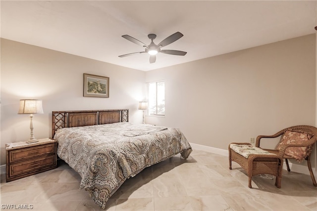 bedroom with ceiling fan and light tile floors