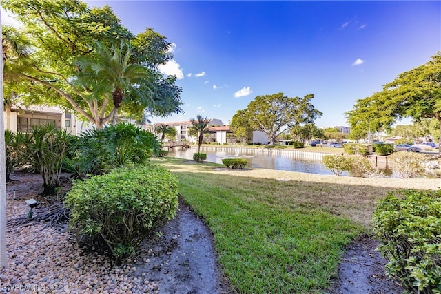 view of yard with a water view