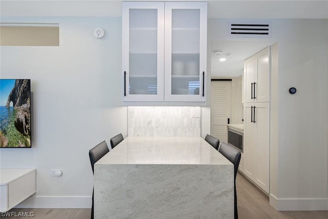 dining area featuring light hardwood / wood-style floors