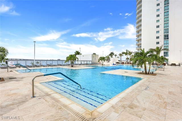 view of pool featuring a patio area