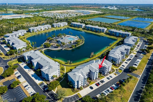 drone / aerial view with a water view