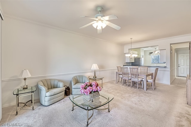 living room with crown molding, light carpet, and ceiling fan with notable chandelier