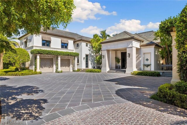 view of front of property with a garage