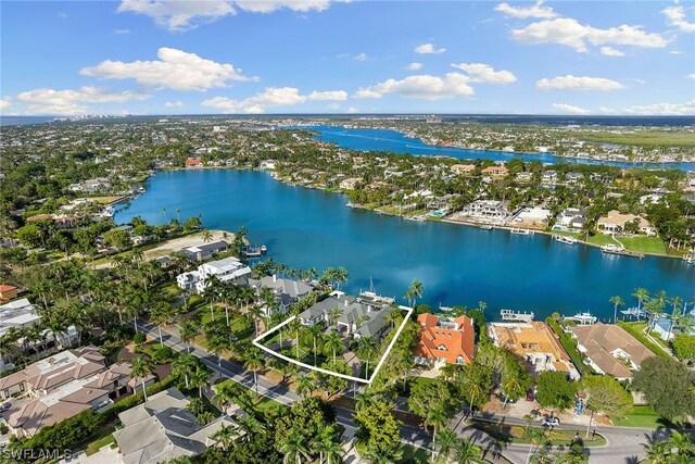 birds eye view of property featuring a water view