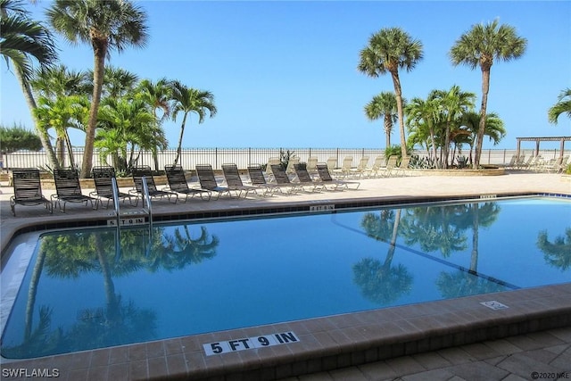 8350 Estero Blvd Unit 423, Fort Myers Beach, FL 33931 - pool with a patio and fence