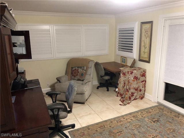 office area with light tile patterned floors and ornamental molding