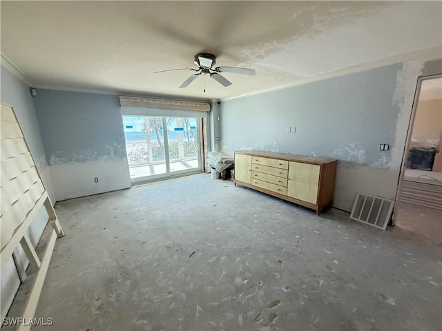 unfurnished bedroom with ceiling fan, ornamental molding, concrete flooring, and access to outside