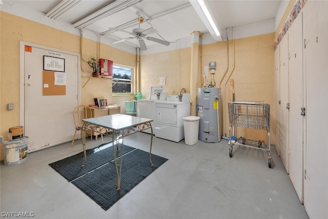 interior space with separate washer and dryer, water heater, and ceiling fan