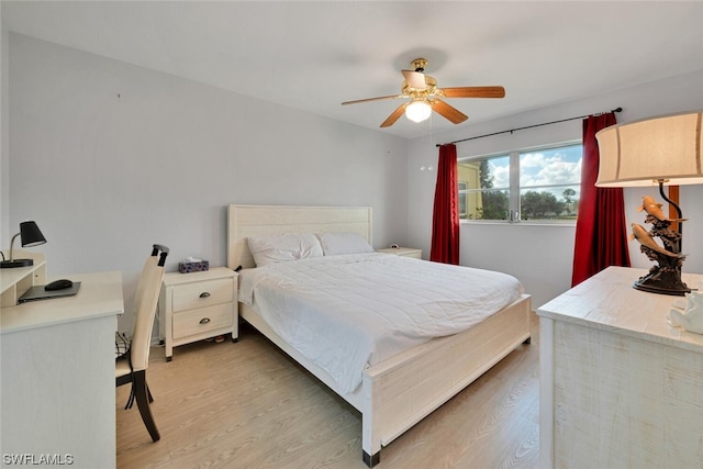 bedroom featuring wood-type flooring and ceiling fan