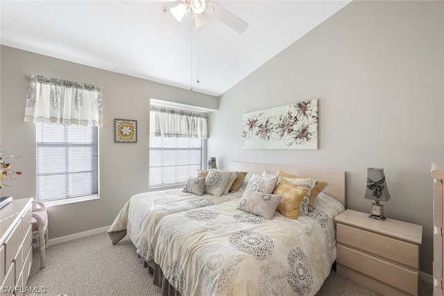 carpeted bedroom featuring vaulted ceiling and ceiling fan