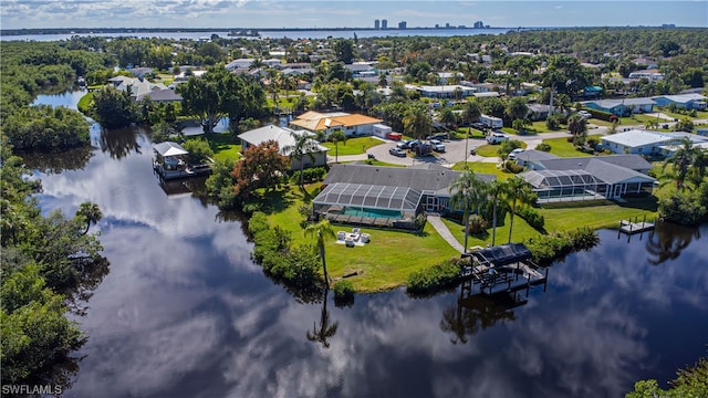 bird's eye view with a water view