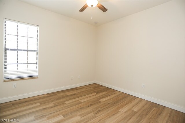 unfurnished room featuring ceiling fan and light hardwood / wood-style flooring