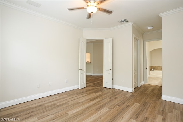 unfurnished bedroom featuring light hardwood / wood-style floors, ornamental molding, and ceiling fan