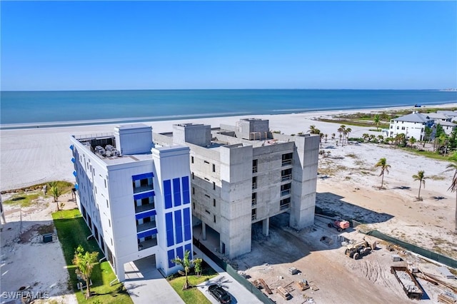 aerial view with a beach view and a water view