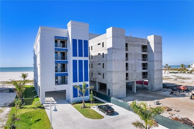 view of property with a water view