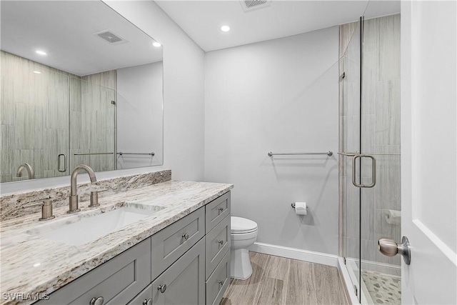 2 Fairview Blvd, Fort Myers Beach, FL 33931 - bathroom with a stall shower, toilet, baseboards, vanity, and recessed lighting
