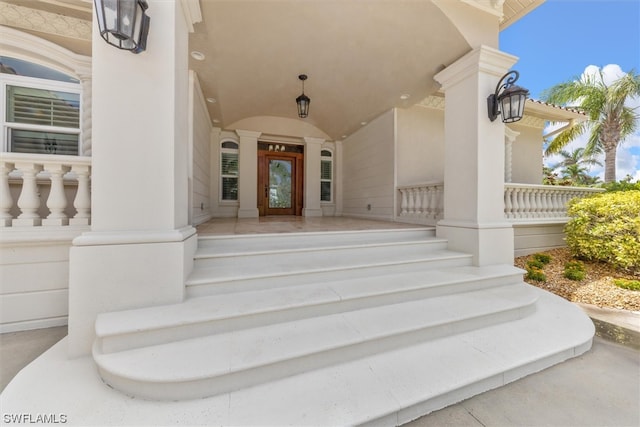 entrance to property with covered porch