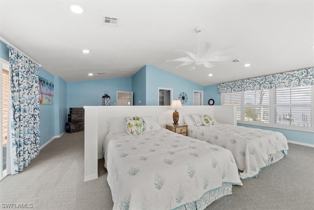 bedroom featuring vaulted ceiling, light colored carpet, and ceiling fan