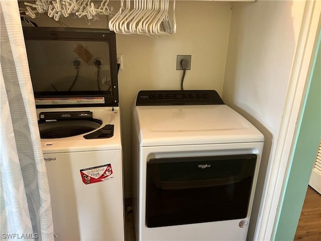 washroom with washer / clothes dryer