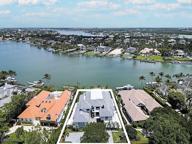 bird's eye view with a water view and a residential view