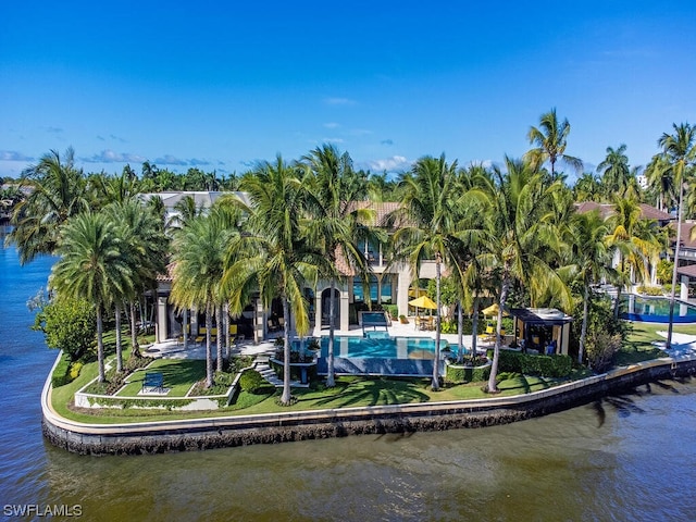 exterior space with a yard and a water view