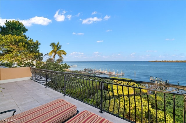 deck featuring a water view