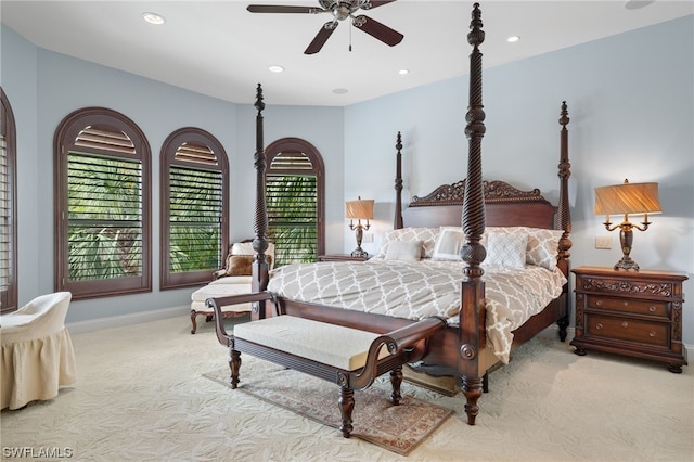 carpeted bedroom featuring ceiling fan