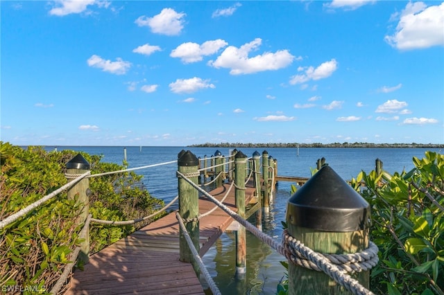 view of dock with a water view