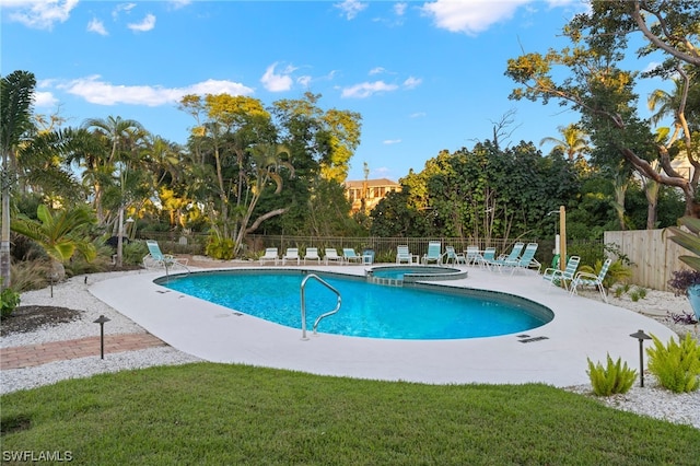 view of swimming pool with a patio