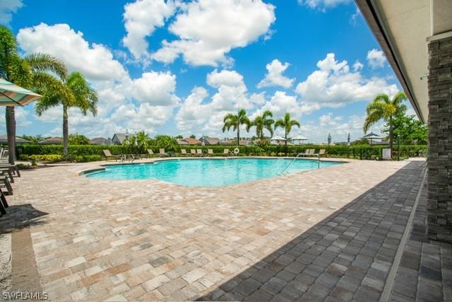 community pool featuring a patio area