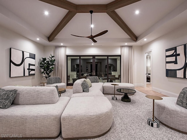 living room featuring lofted ceiling with beams, wood-type flooring, and ceiling fan