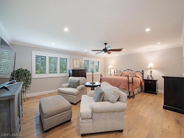 bedroom featuring ceiling fan, light hardwood / wood-style flooring, and ornamental molding