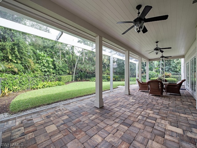 view of patio featuring ceiling fan