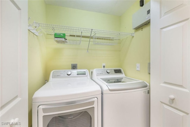 washroom featuring separate washer and dryer