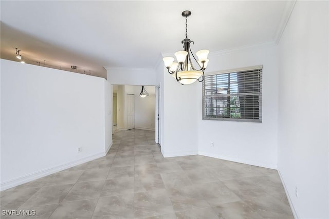 unfurnished dining area with ornamental molding and a chandelier