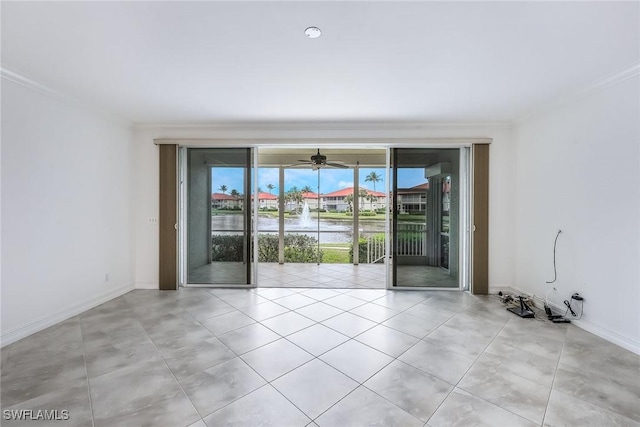 empty room with ornamental molding and a wealth of natural light