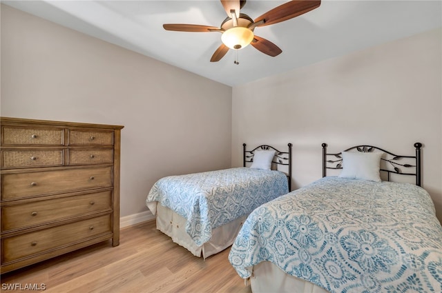 bedroom featuring ceiling fan and light wood-type flooring