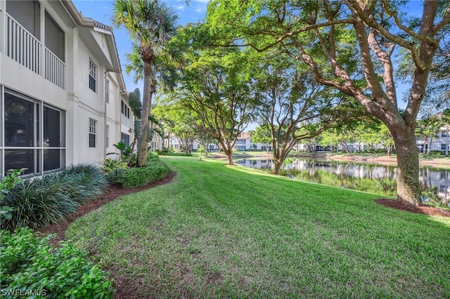 view of yard with a water view