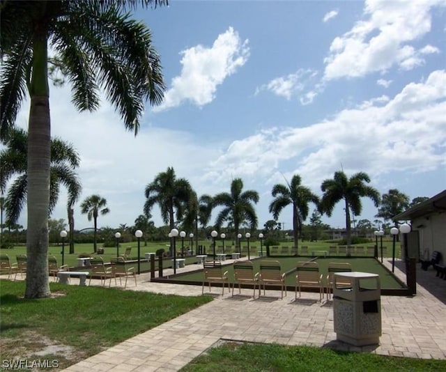 view of community featuring a lawn