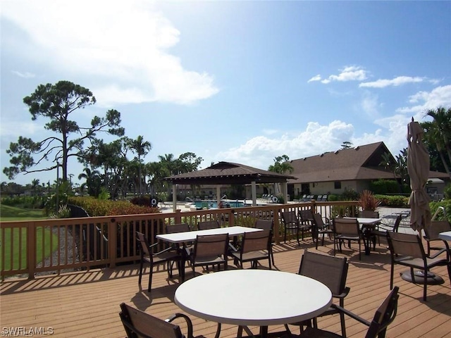 wooden terrace with a gazebo