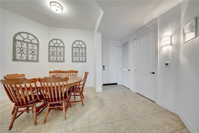 view of tiled dining space