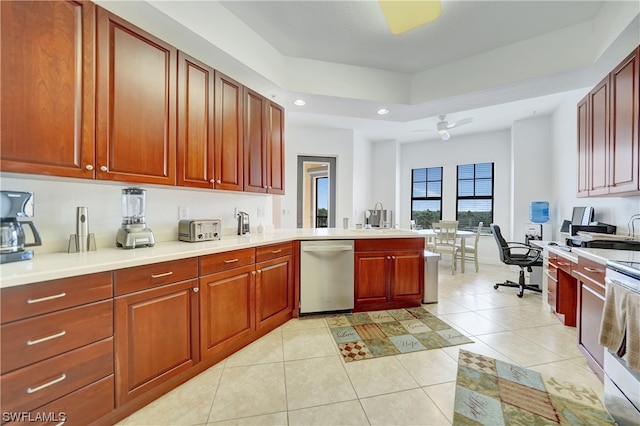 kitchen featuring sink, ceiling fan, range, dishwasher, and light tile patterned flooring