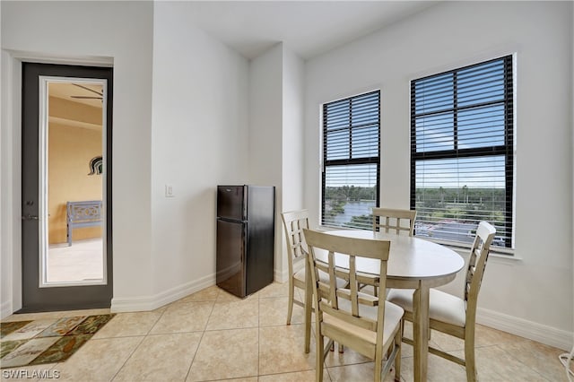 dining room featuring light tile patterned floors