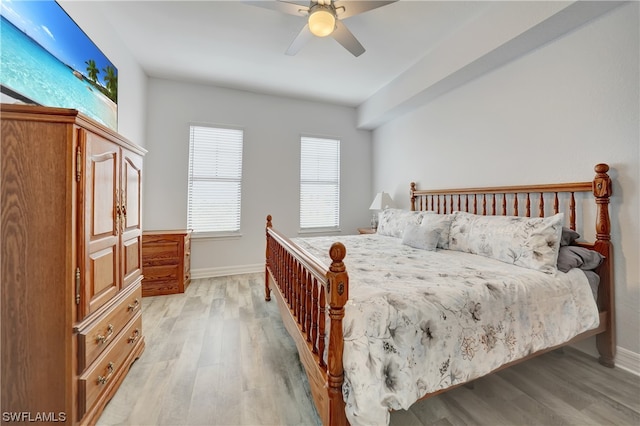 bedroom featuring light hardwood / wood-style floors and ceiling fan