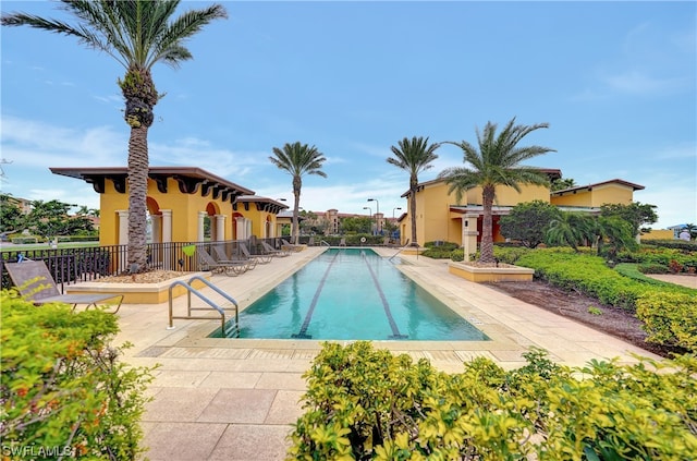 view of swimming pool featuring a patio