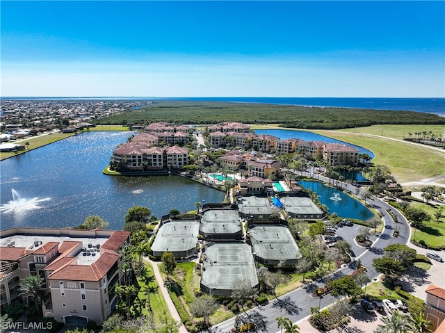 birds eye view of property featuring a water view